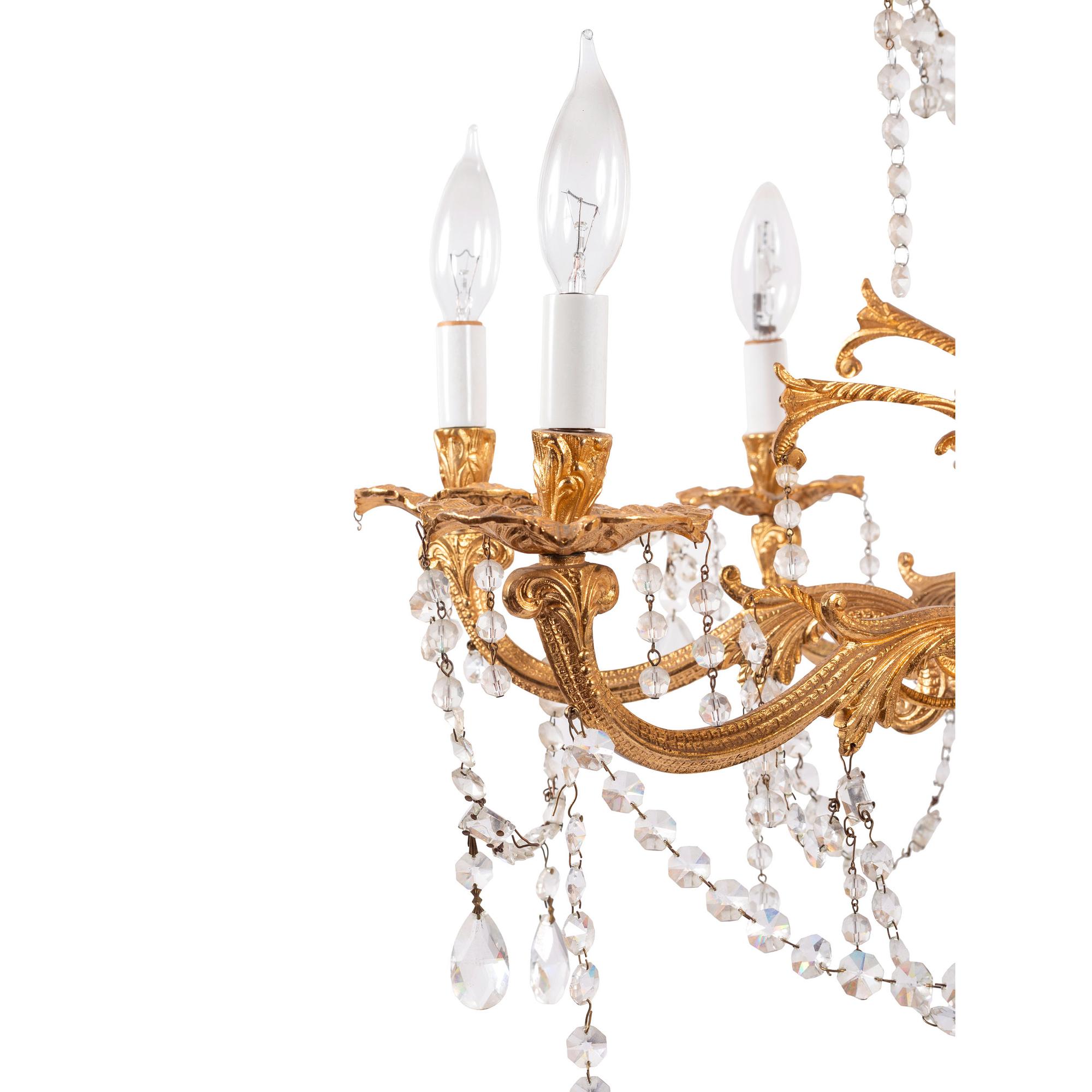 A Louis XV Style Gilt Metal and Cut-Glass Eight-Light Chandelier