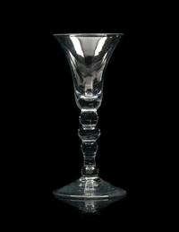A Group of Three English Knopped Stem Wine Glasses