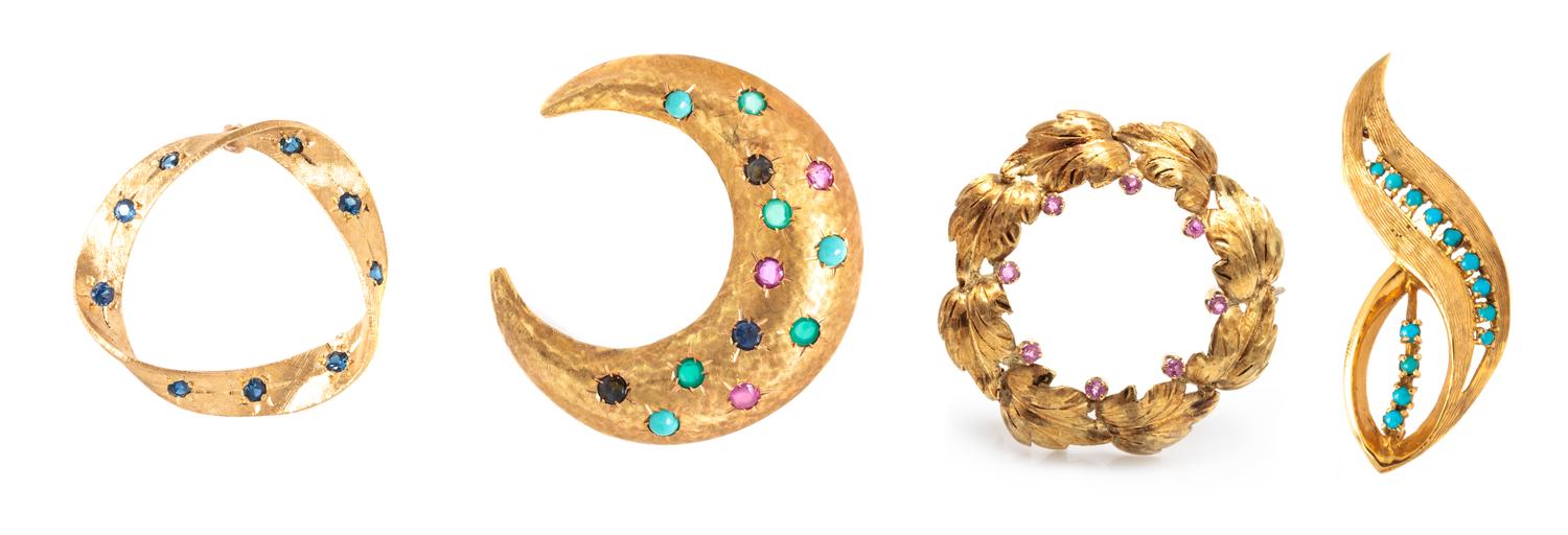 A Collection of Yellow Gold and Multi Gem Brooches, 17.20 dwts.