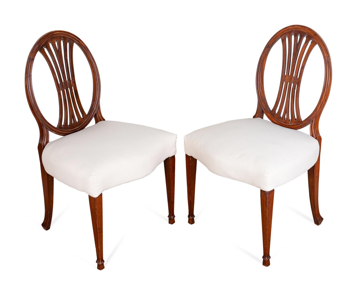 A Set of Six George III Carved Mahogany Dining Chairs
