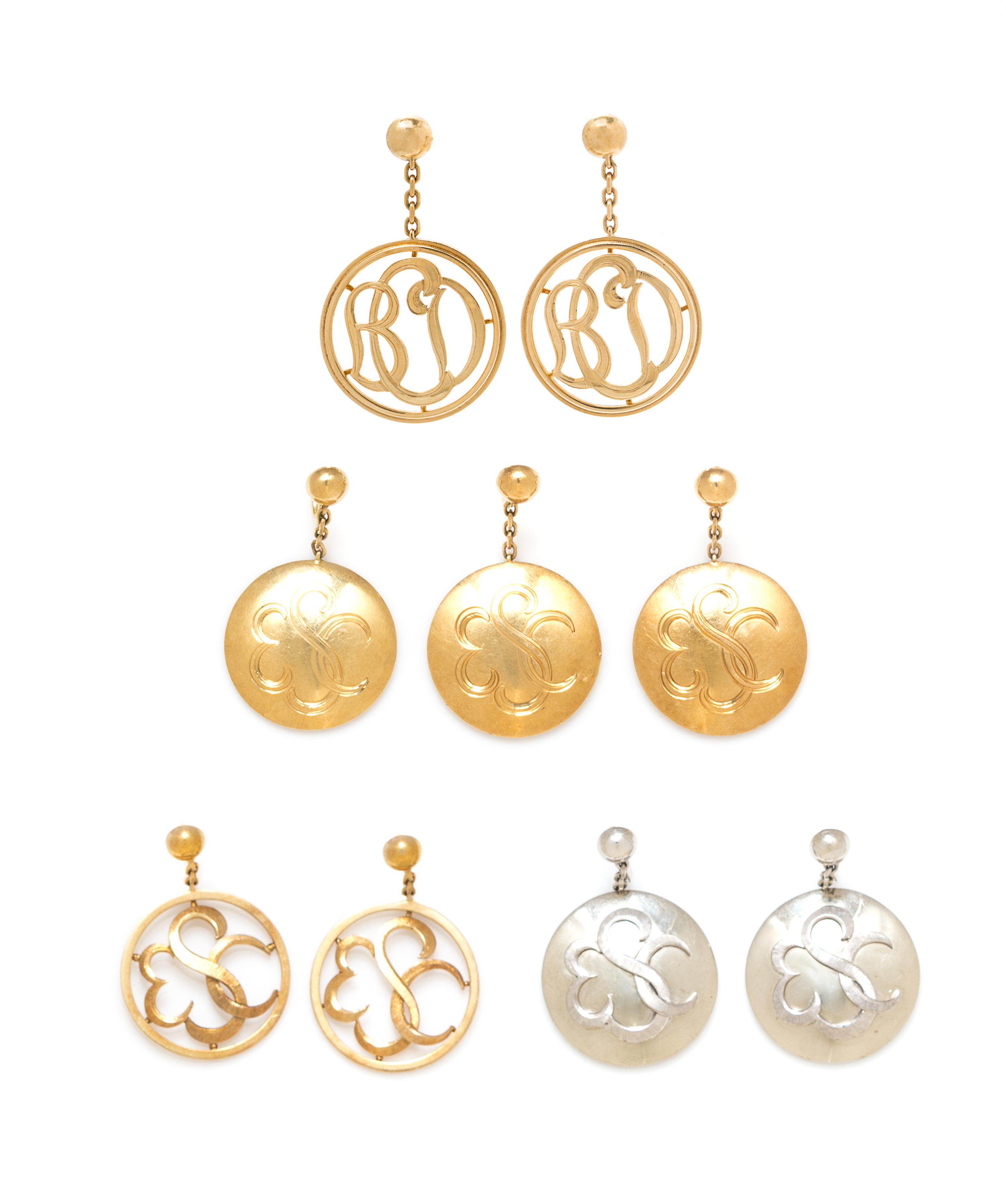 A Collection of 18 Karat Bicolor Gold Monogram Pendant Earclips, 43.30 dwts.