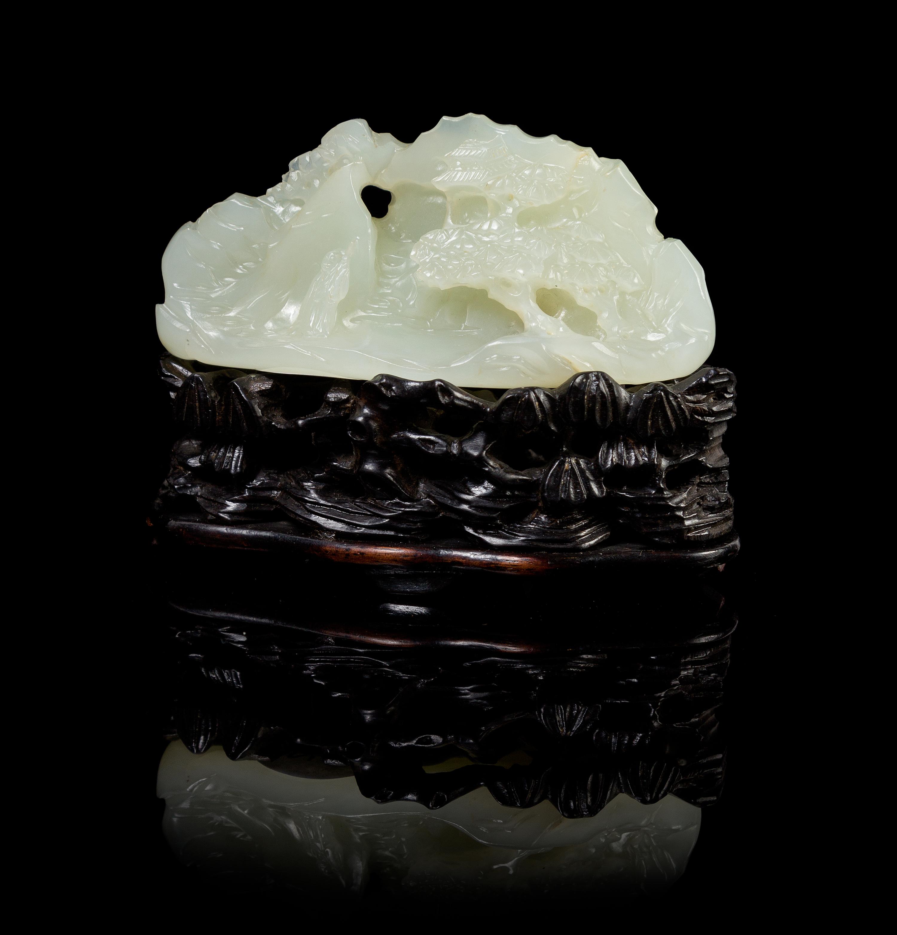 A Chinese White Jade Mountain and Stand 18TH/19TH CENTURY Height of jade 1 1/2 x width 3 1/8 inches. — 18TH/19TH CENTURY