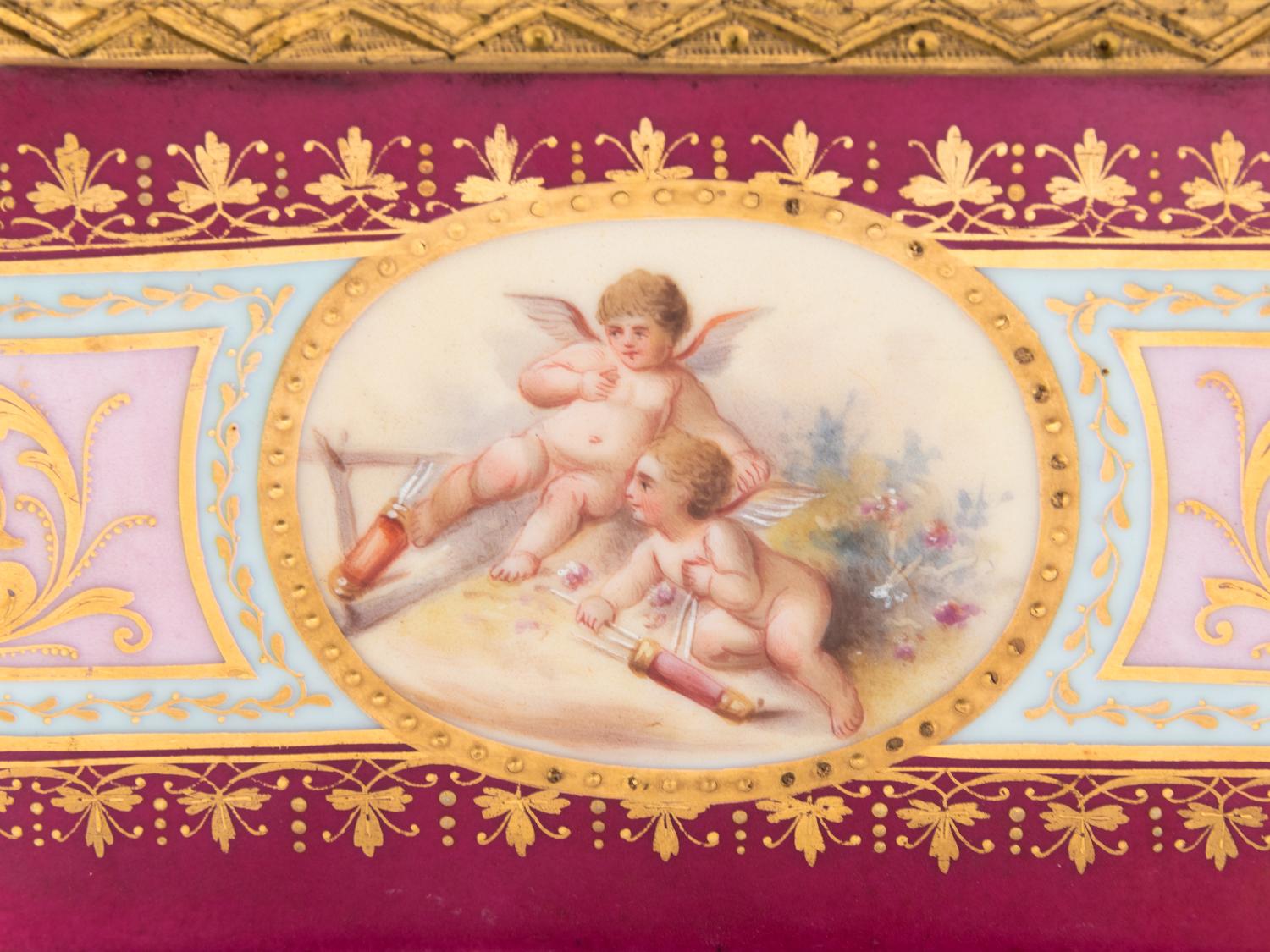 A Vienna Gilt Metal Mounted, Painted and Parcel Gilt Porcelain Table Casket