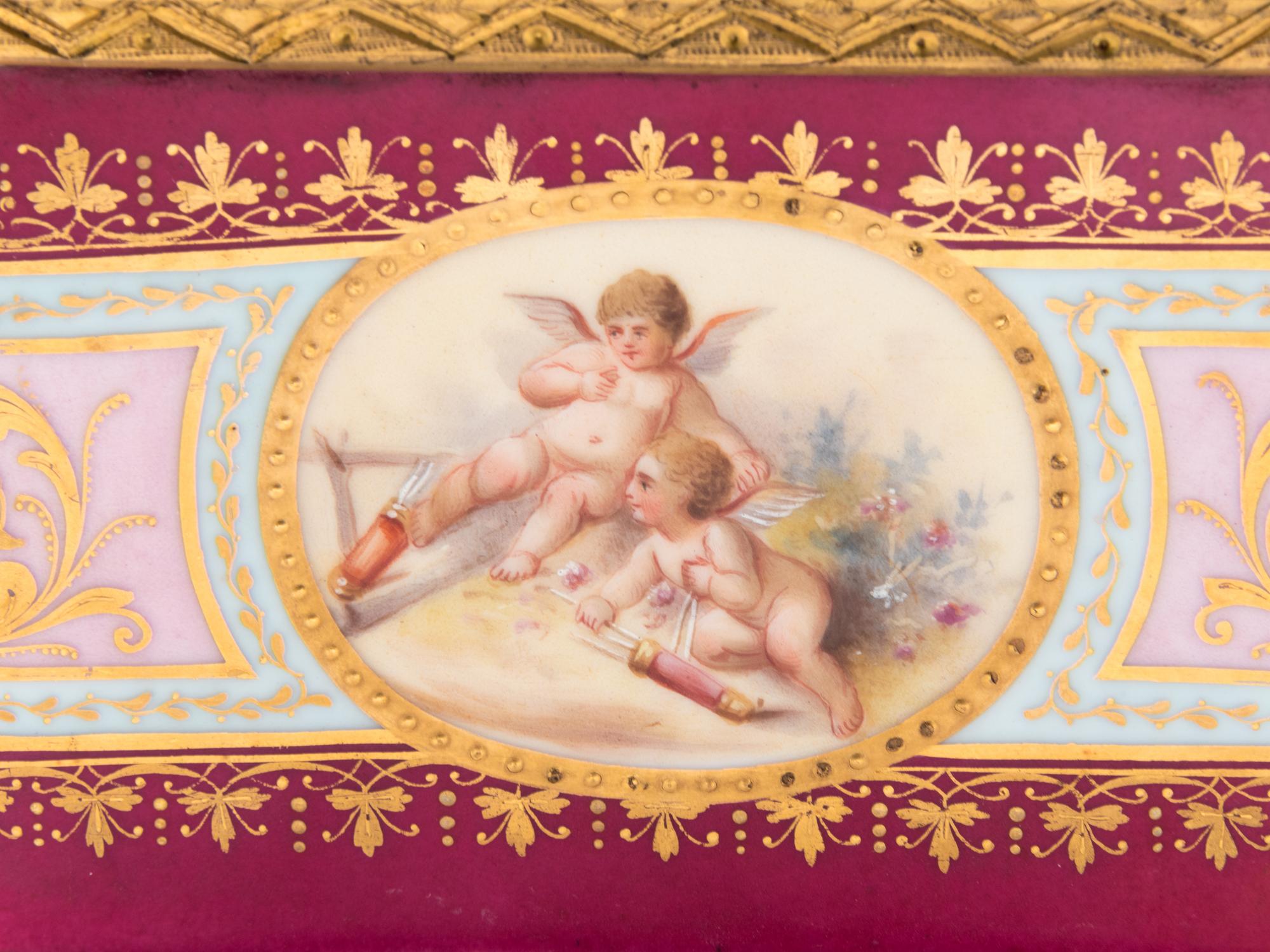 A Vienna Gilt Metal Mounted, Painted and Parcel Gilt Porcelain Table Casket
