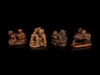 Four Japanese Carved Wood Figural-Form Netsuke
