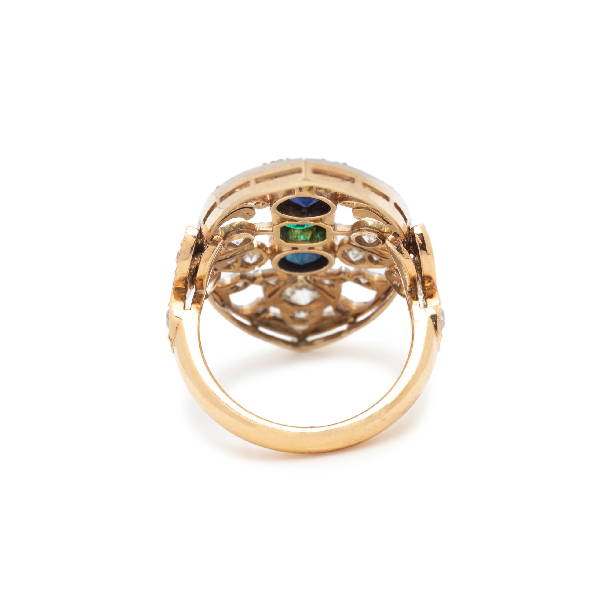 EMERALD, SAPPHIRE AND DIAMOND RING