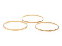 COLLECTION OF YELLOW GOLD BANGLE BRACELETS