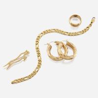 A collection of four pieces of gold jewelry