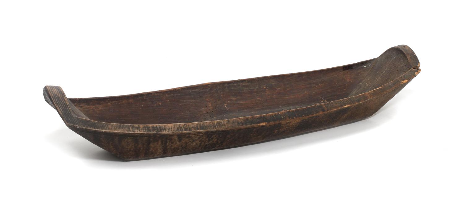 A Kwakwaka'wakw Wood Dish Height 7 1/4 x length 39 x width 13 1/2 inches. — SECOND HALF 19TH CENTURY