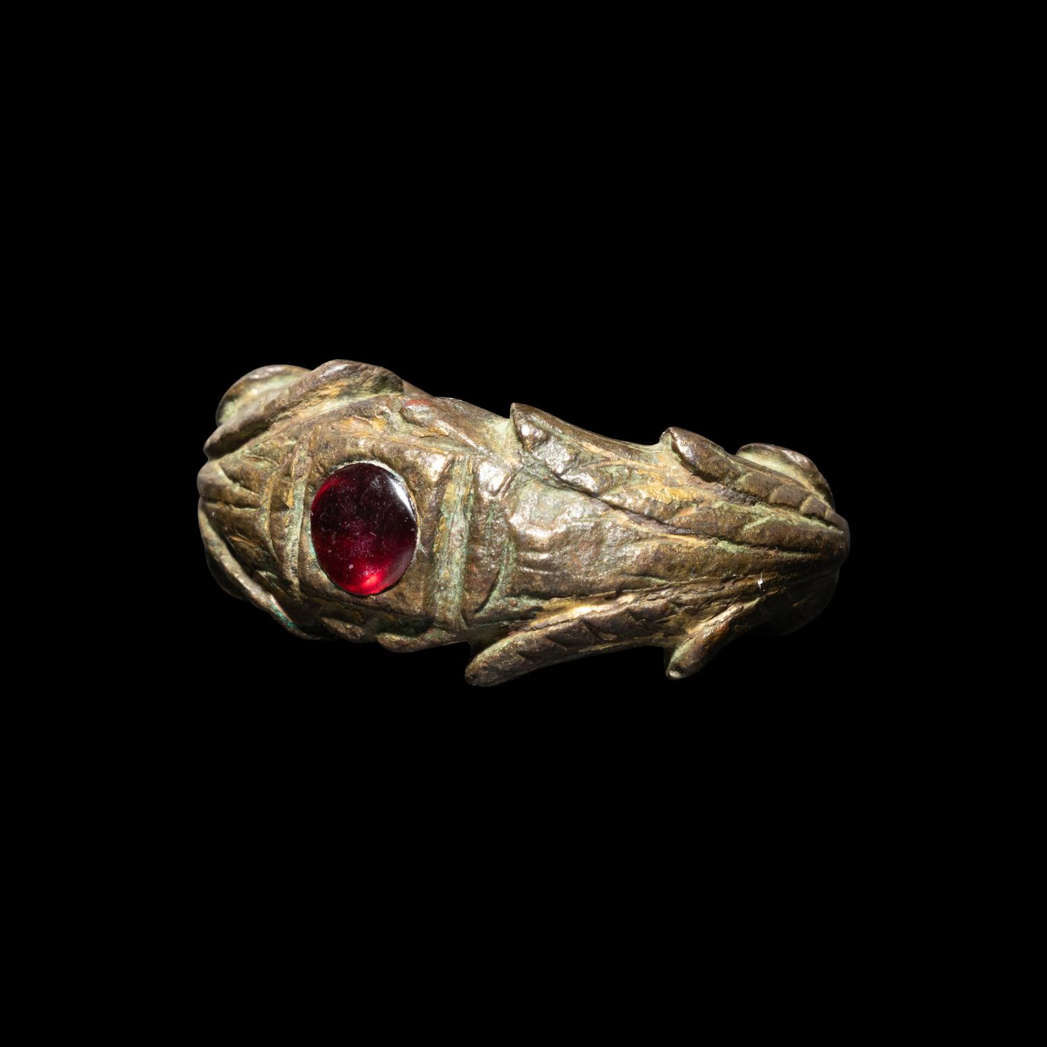 A Roman Gilt-Bronze and Garnet Ring