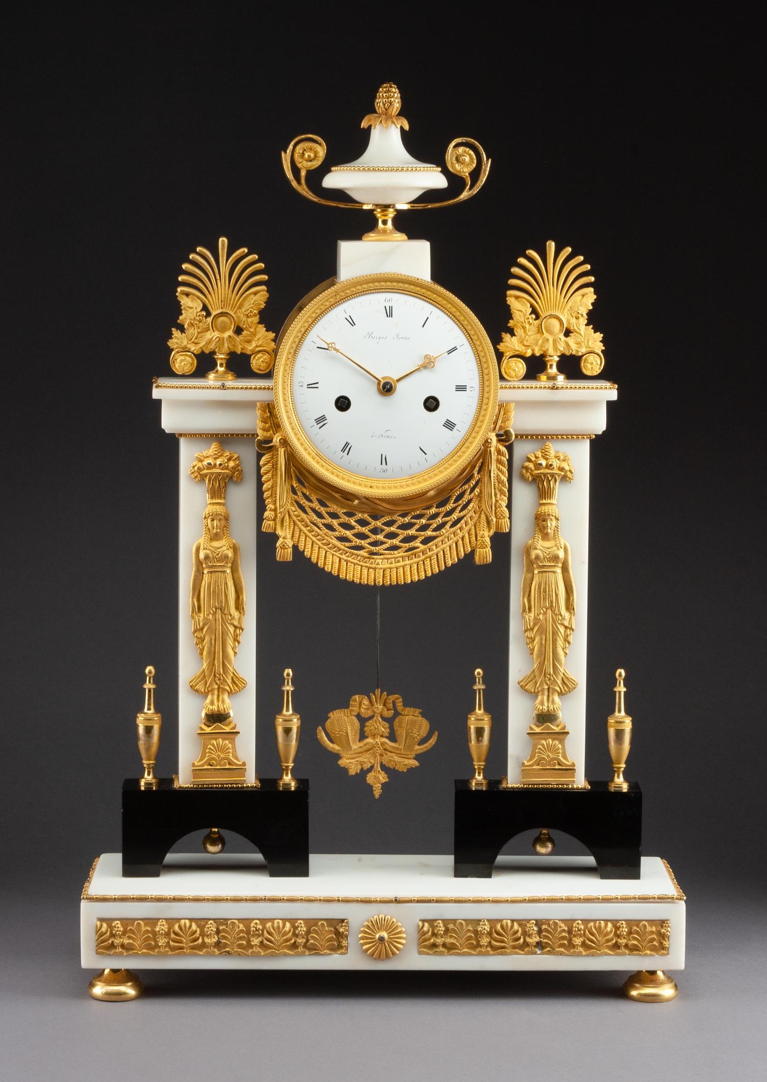 A French Neoclassical Gilt Bronze and Marble Mantel Clock Height 20 3/8 x width 13 3/8 inches. — 19TH CENTURY