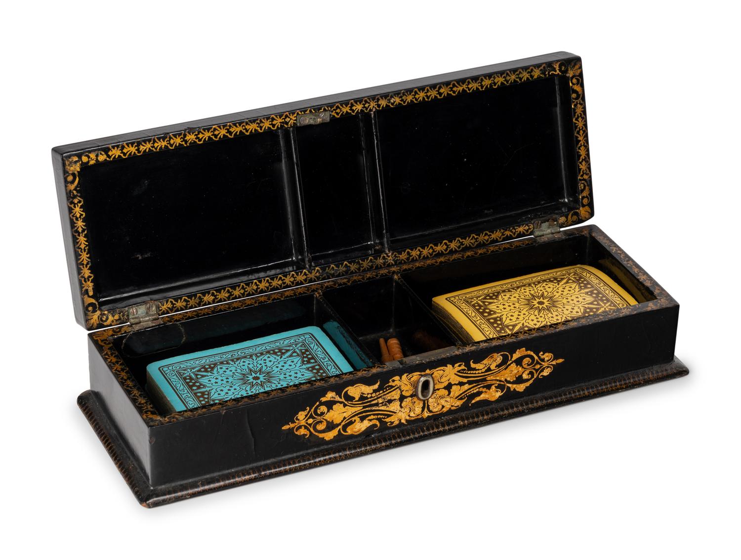 A Victorian Mother of Pearl-Inset and Parcel-Gilt Papier-Mache Cribbage Box