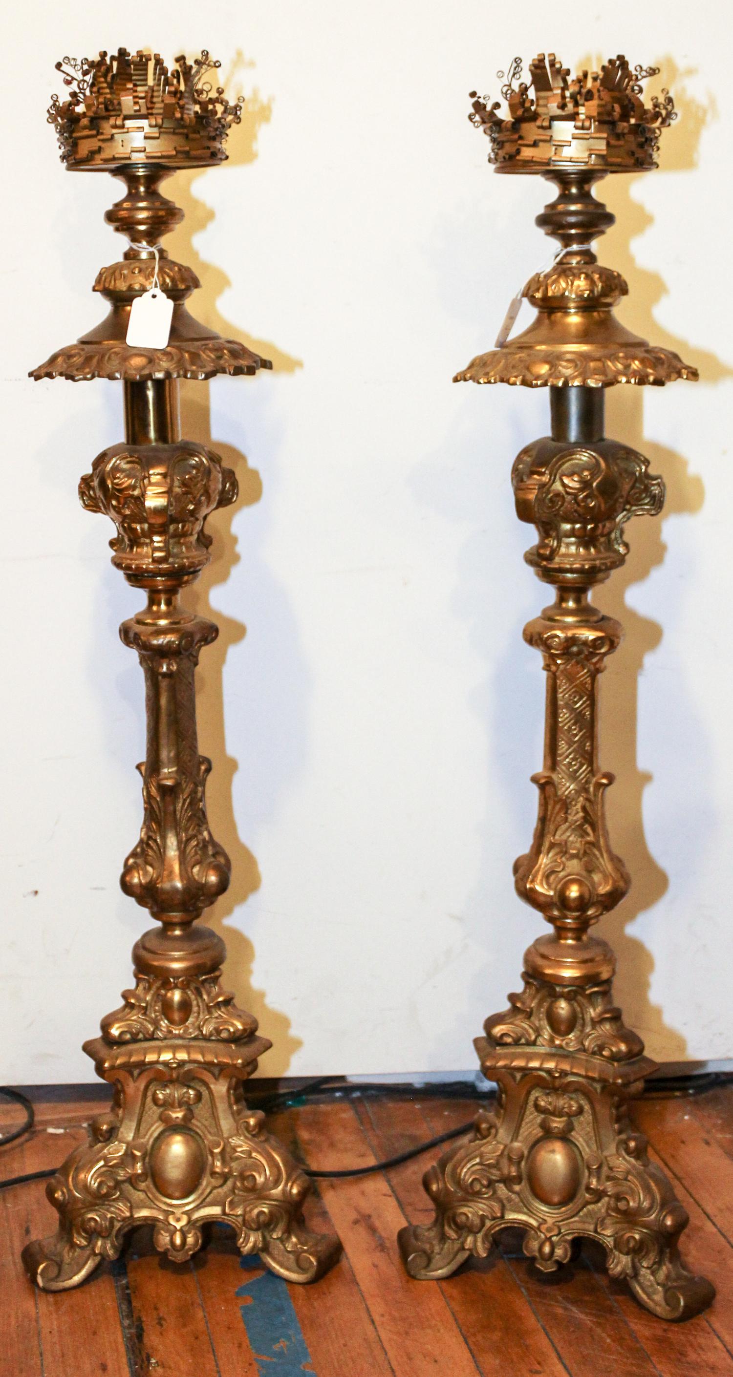 A Pair of Brass Prickets Height 31 1/2 inches. — FIRST HALF 20TH CENTURY