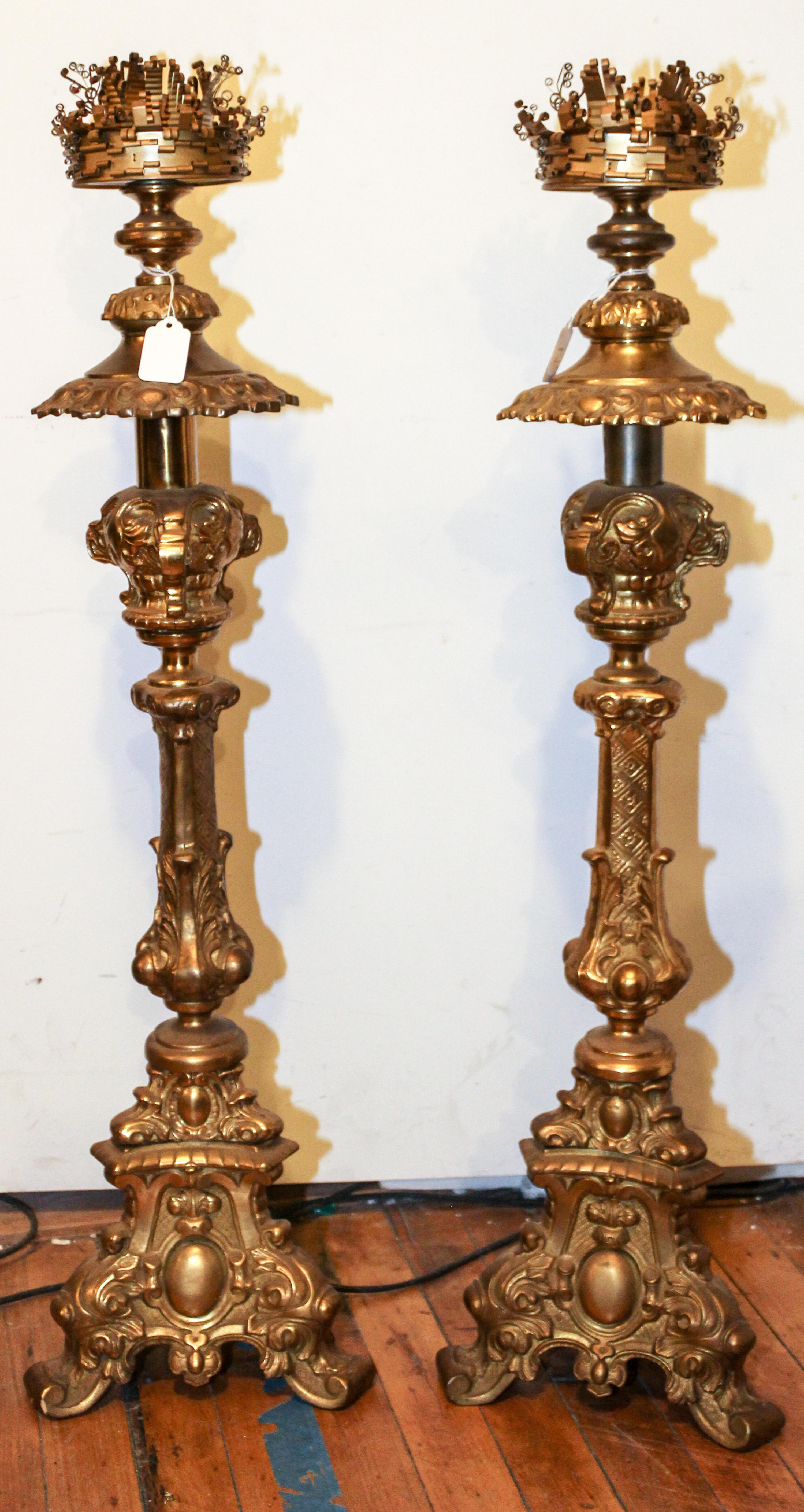 A Pair of Brass Prickets Height 31 1/2 inches. — FIRST HALF 20TH CENTURY