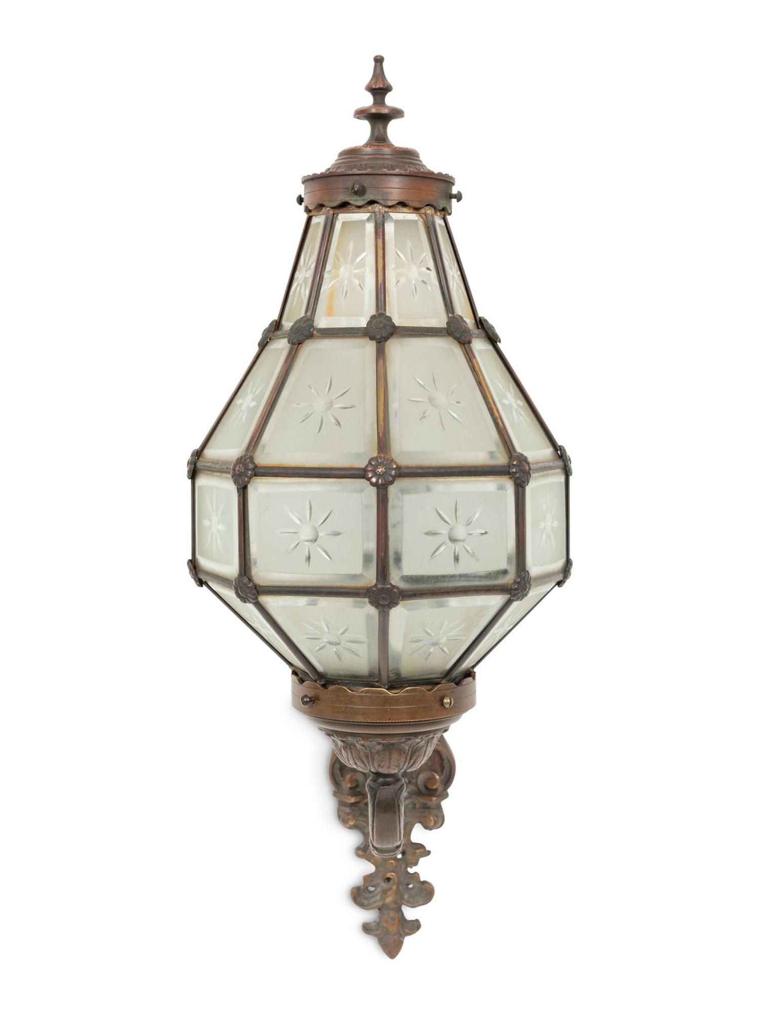A Bronze and Glass Wall Sconce