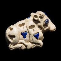 A Mesopotamian Marble and Lapis Lazuli Inlay Recumbent Calf