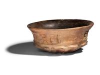 A Maya Terracotta Vessel with Glyphs