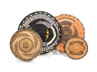 Eight Hopi Basket Trays Diameter 14 1/4 inches.