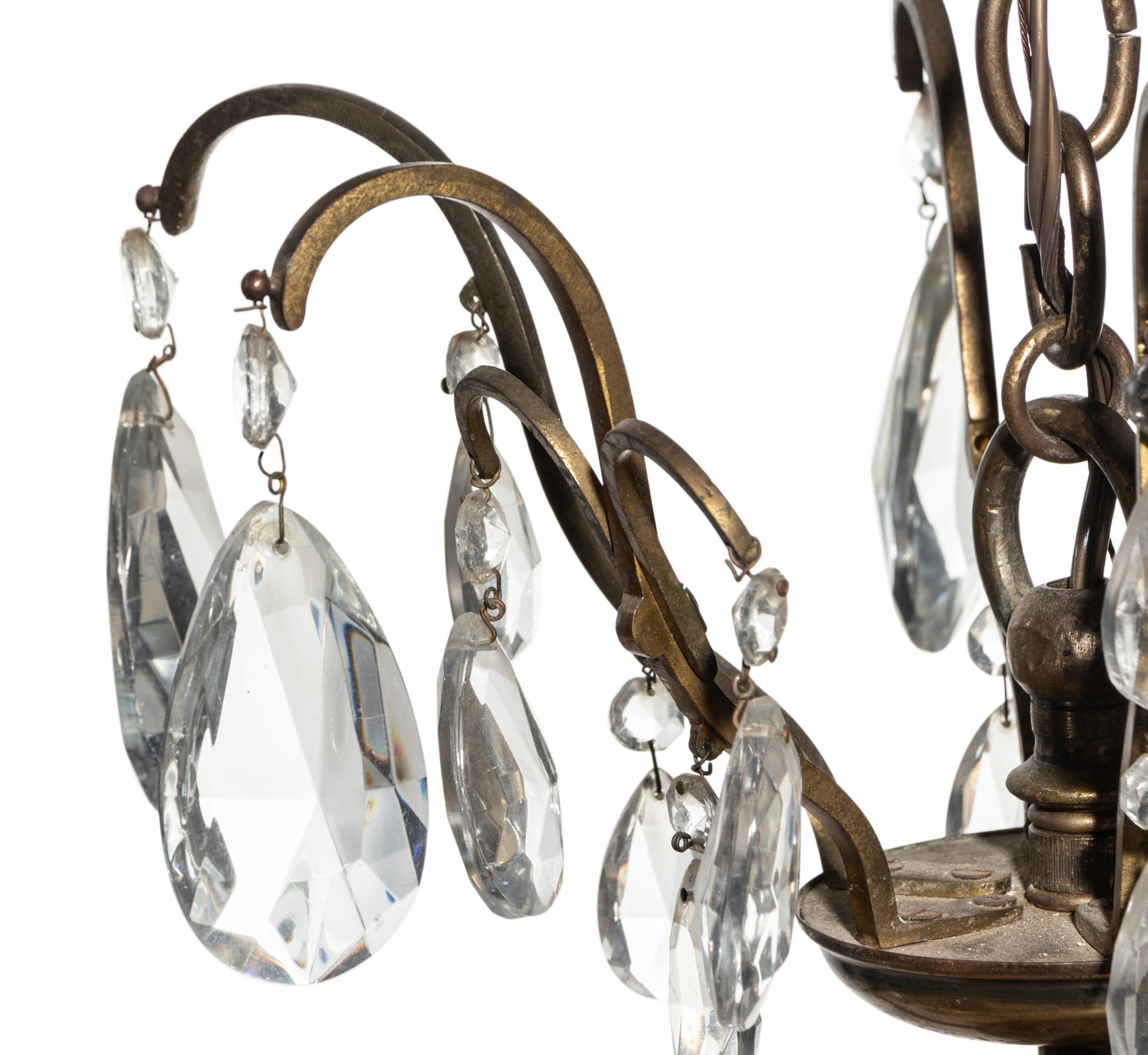 A Large Louis XV Style Bronze and Glass Ten-Light Chandelier