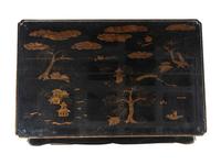 A Contemporary Ebonized and Parcel-Gilt Low Table