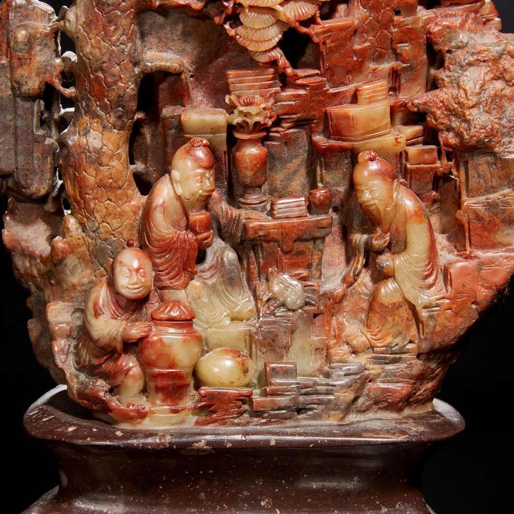 A Chinese carved variegated soapstone mountain with sages 壽山石山子 Late Qing to Republic period ?????