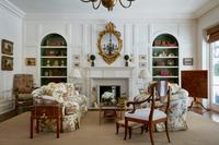 A Matched Pair of Upholstered Love Seats, One by Brunschwig & Fils — 20TH CENTURY