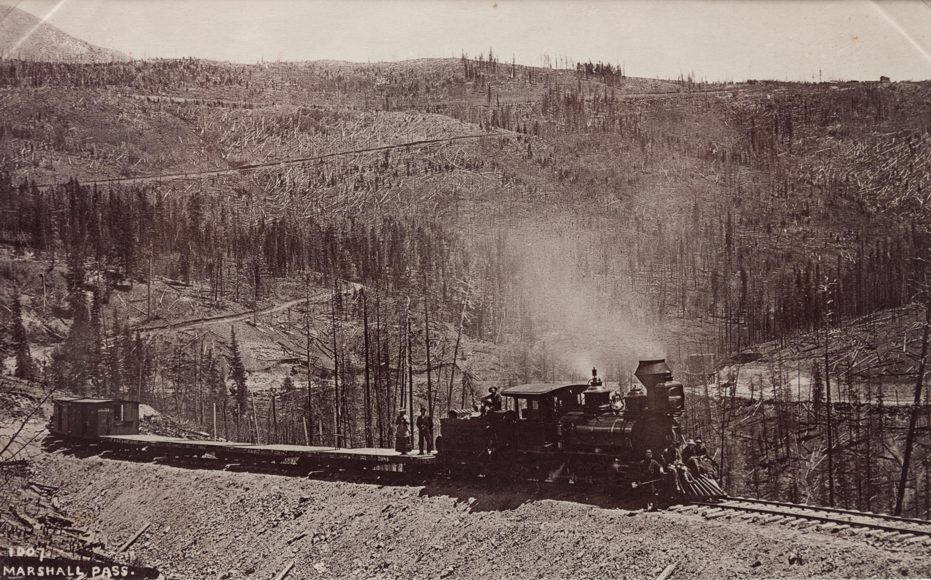 A group of five photographs (854. The Loop; 699. A Glimpse of Pikes Peak. Briarhurst; 1007. Marshall Pass; 3232. Summit of Fremont Pass, 11540 ft.; Untitled (Crossing over a pass))