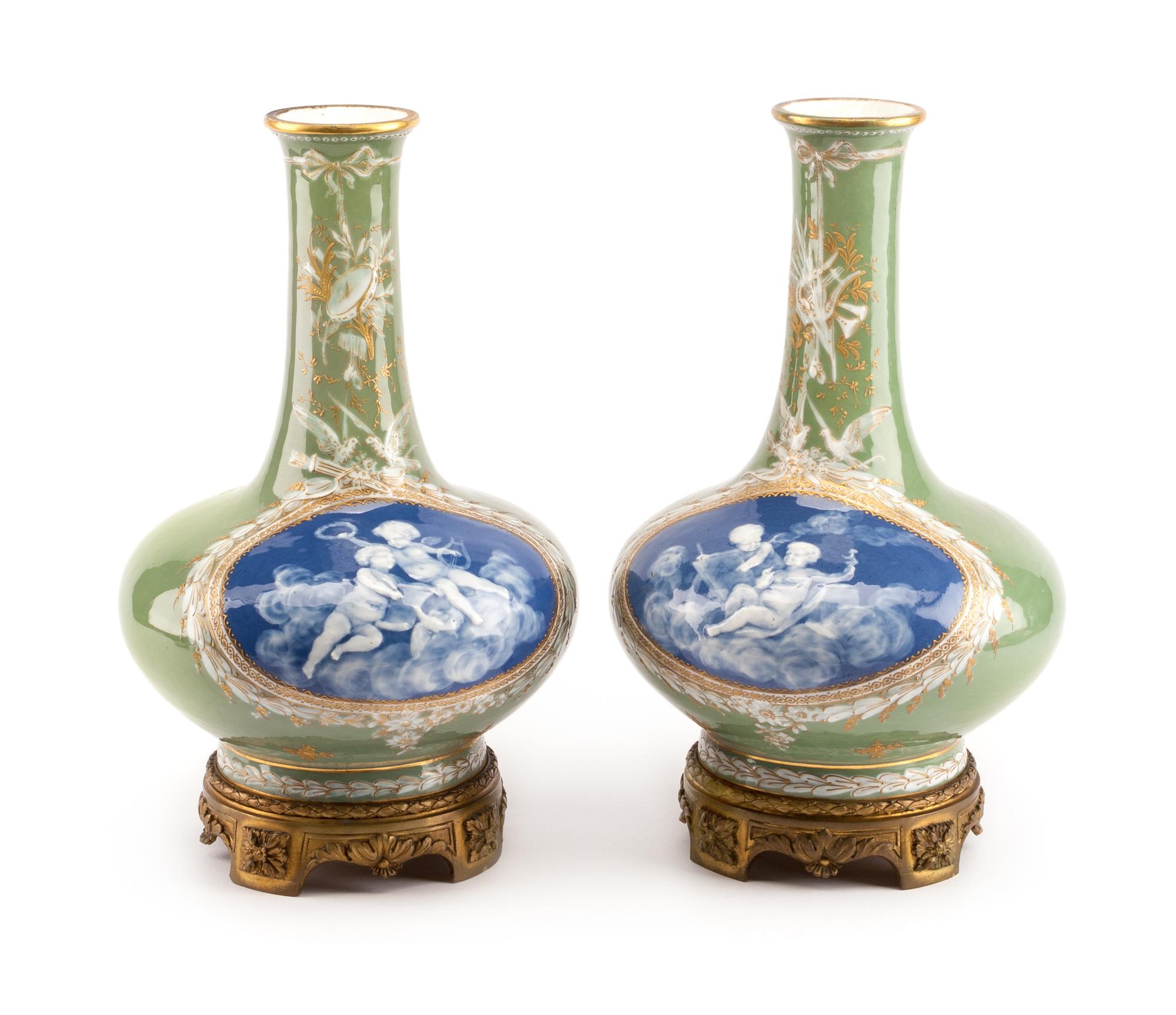 A Pair of French Gilt Bronze Mounted Pate-Sur-Pate Porcelain Vases Height overall 13 1/2 inches. — LIKELY LIMOGES, LATE 19TH/EARLY 20TH CENTURY