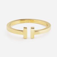 An 18K Yellow Gold " T" Bracelet by Tiffany & Co.