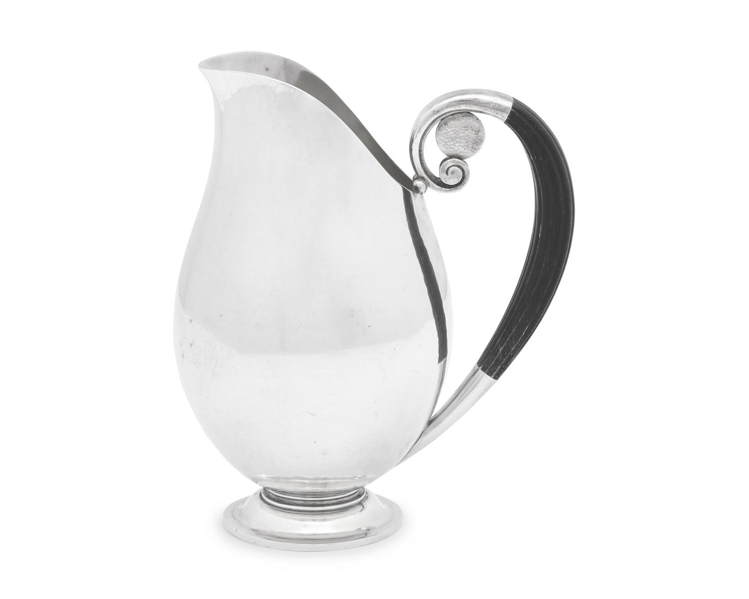 A Johan Rohde Designed Georg Jensen Silver Schilling Pitcher