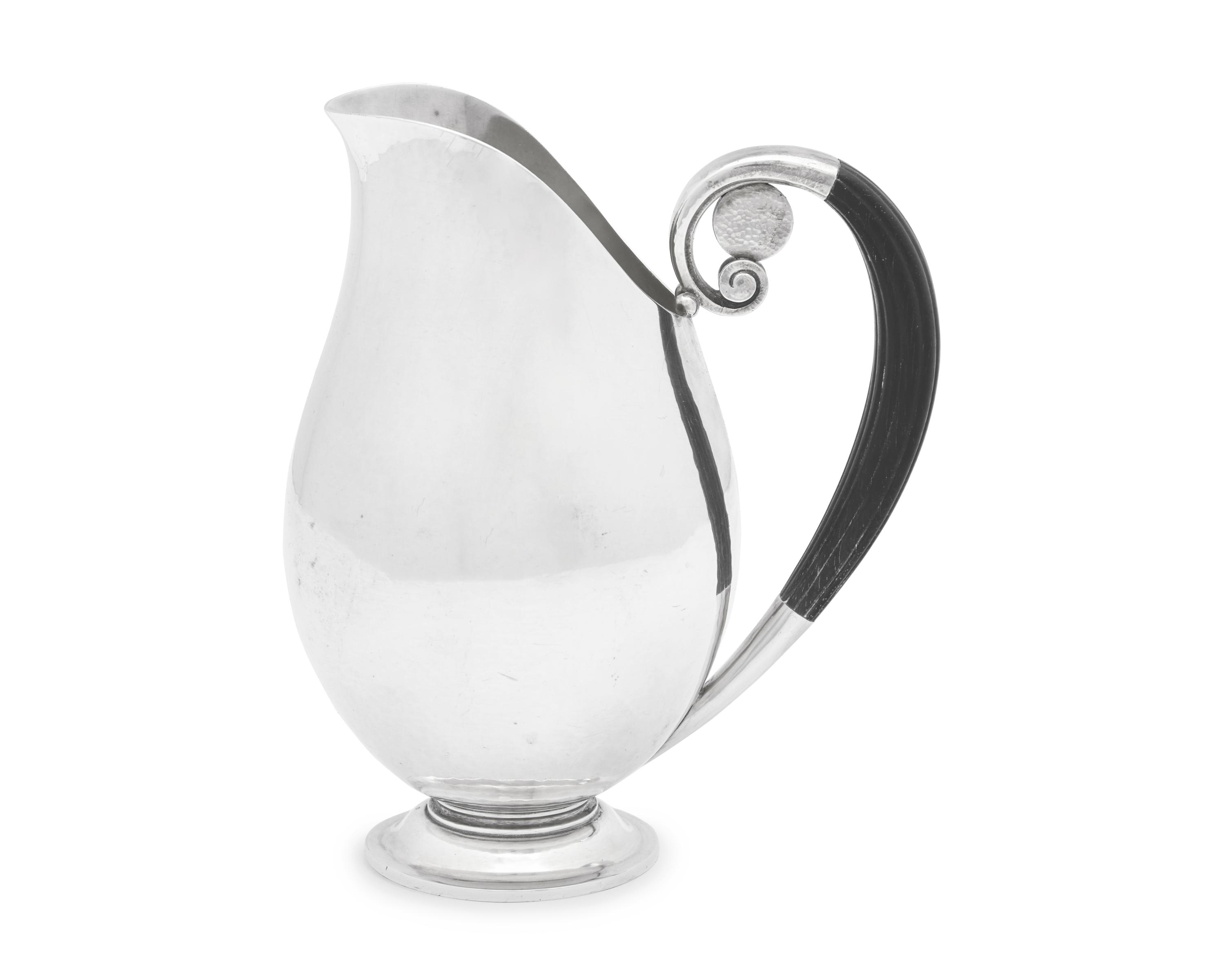 A Johan Rohde Designed Georg Jensen Silver Schilling Pitcher