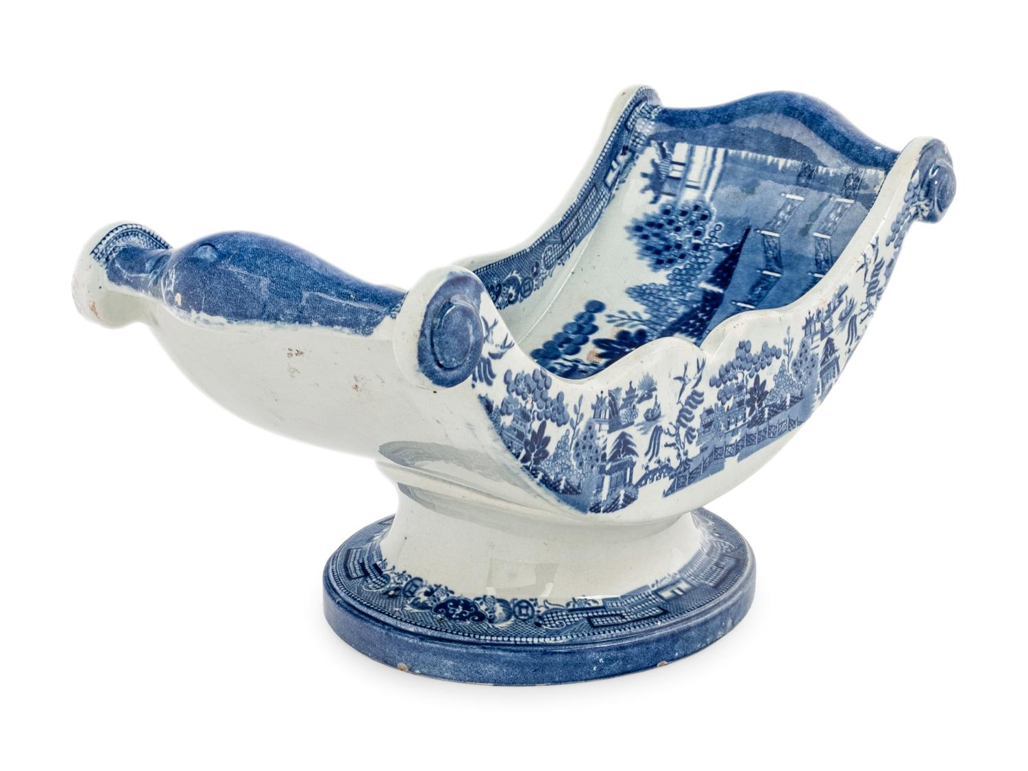 A Staffordshire Blue Willow Cheese Wheel Stand