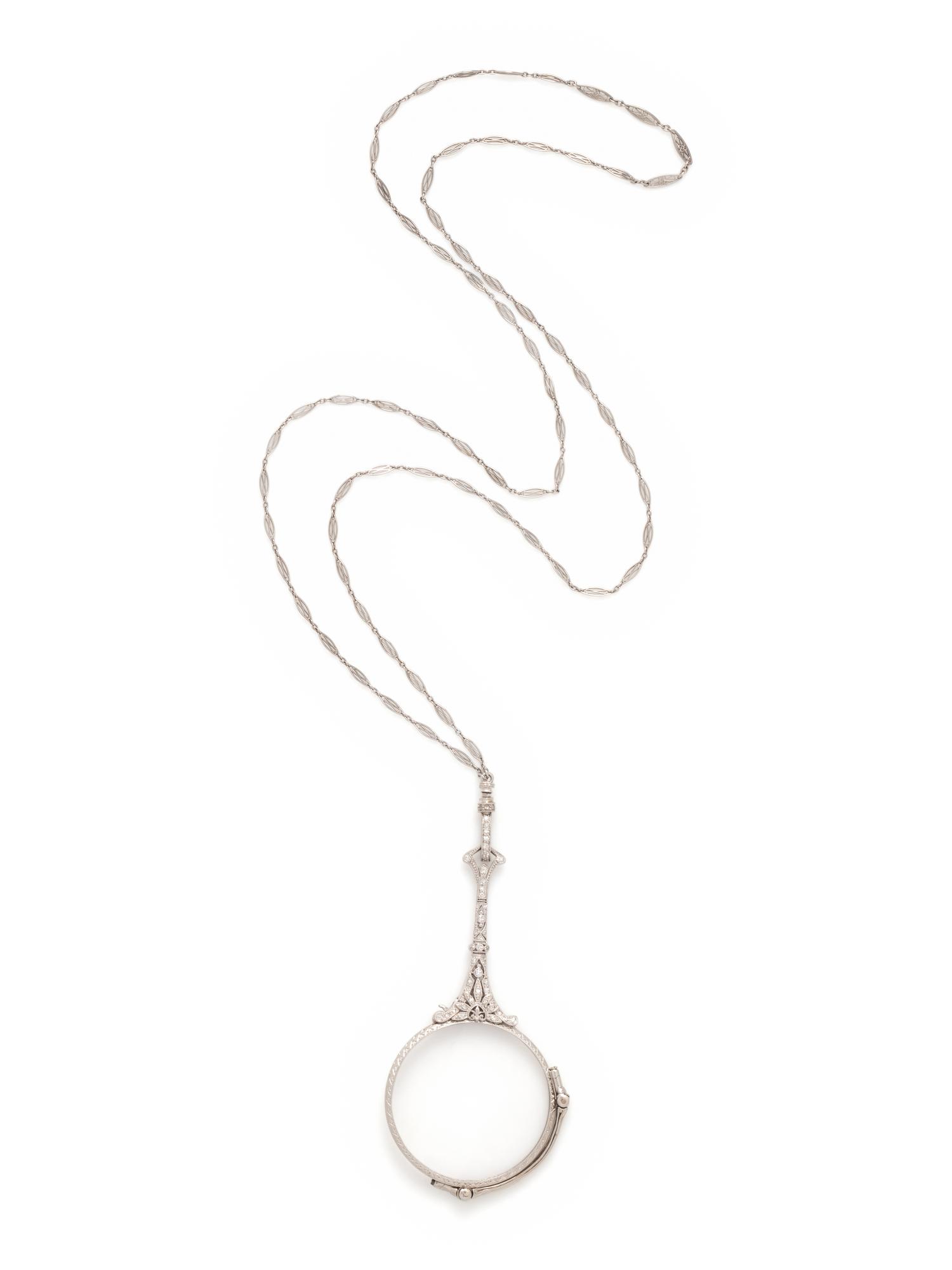 EDWARDIAN, PLATINUM AND DIAMOND LORGNETTE WITH LONGCHAIN