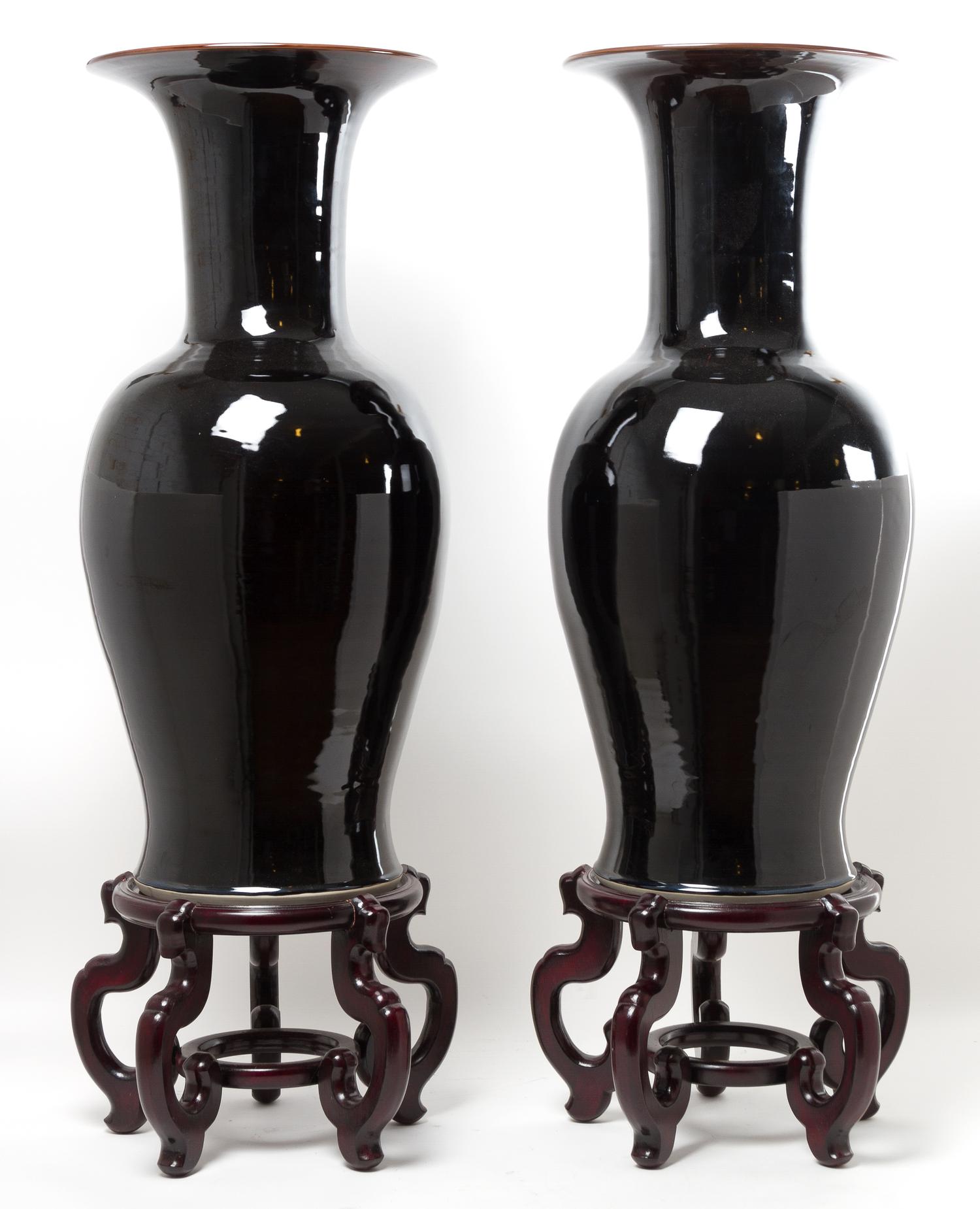 A Pair of Contemporary Ceramic Floor Vases Height 32 1/2 inches.