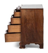 A George III Figured Mahogany Serpentine Front Bachelor's Chest