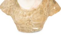 A Continental Carved Alabaster Bust of a Young Maiden