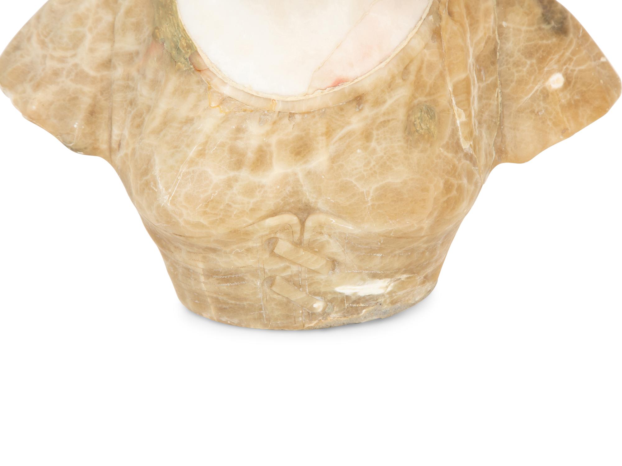 A Continental Carved Alabaster Bust of a Young Maiden