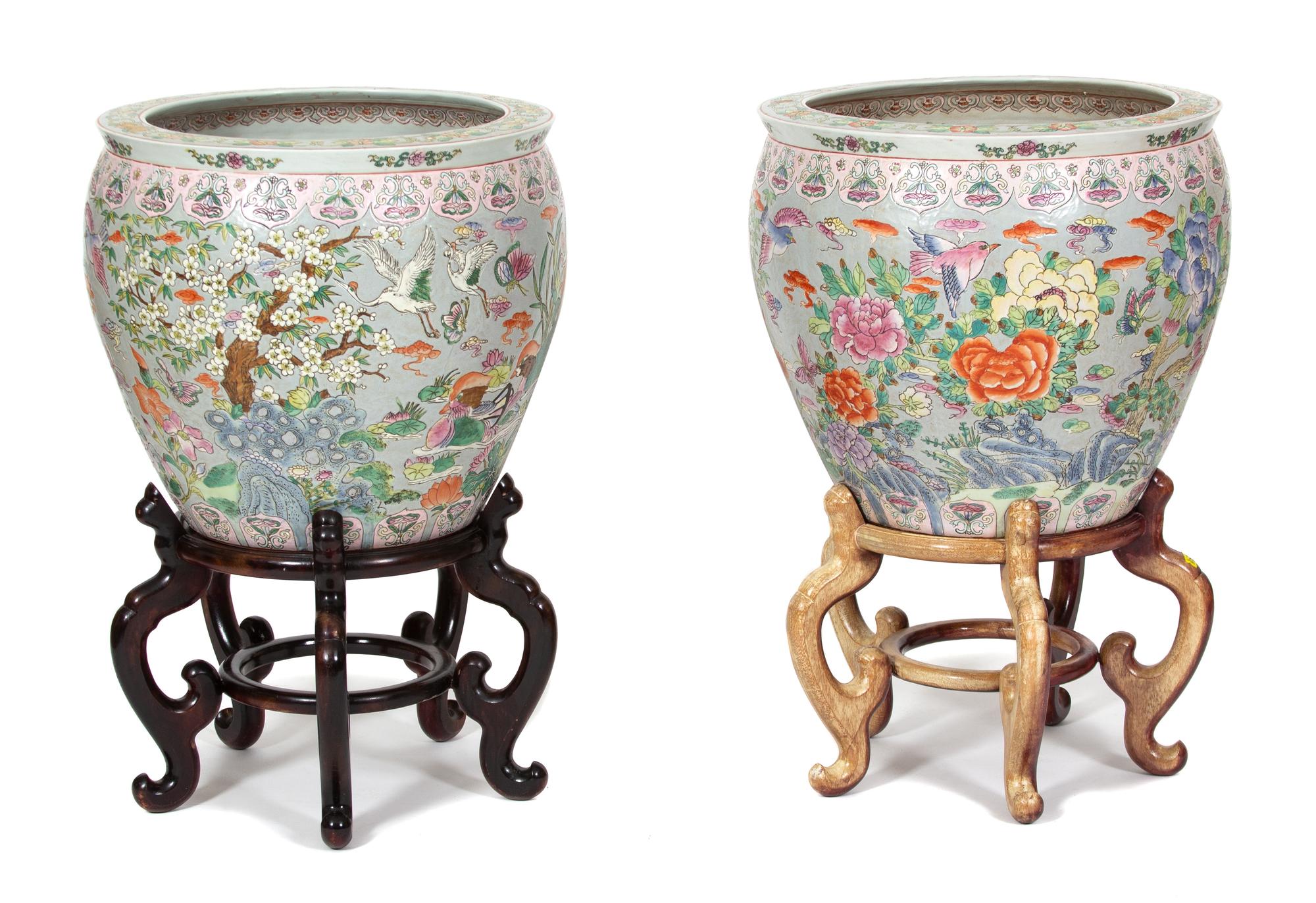A Pair of Chinese Export Famille Rose Fish Bowls Height 20 x diameter 22 inches. — 20TH CENTURY
