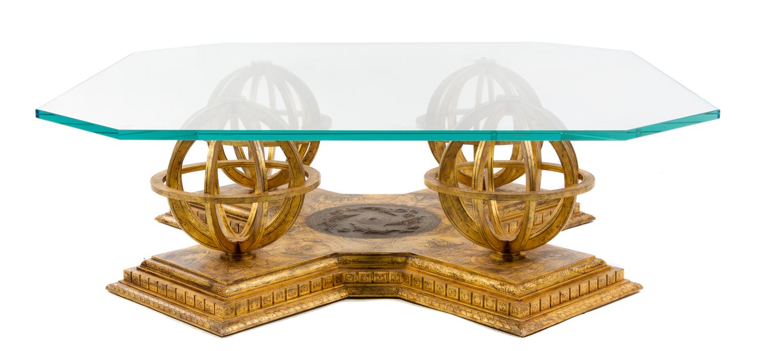 A Gilt Iron and Glass Low Table Height 16 3/4 x width 52 x depth 52 inches.