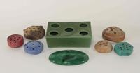A Group of Six Early Haeger Pottery Flower Frogs Width of widest 8 inches.