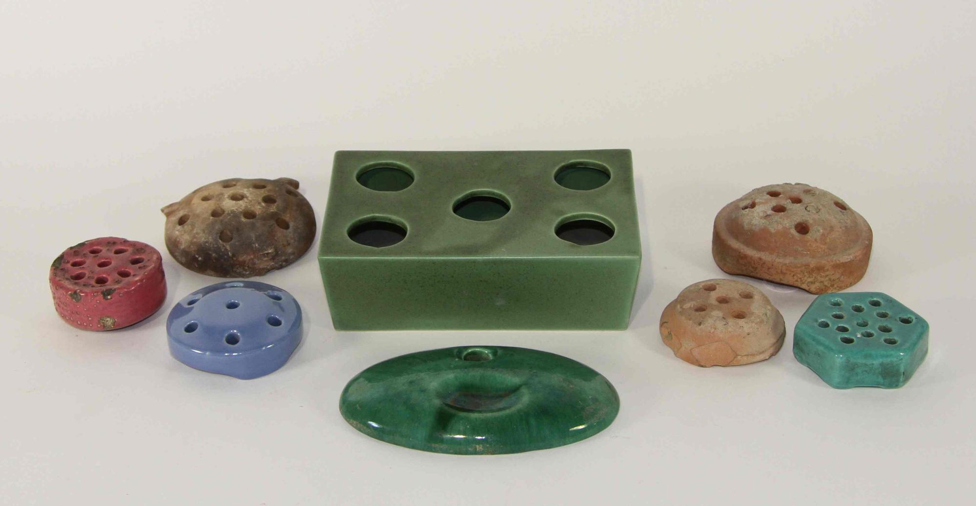 A Group of Six Early Haeger Pottery Flower Frogs Width of widest 8 inches.