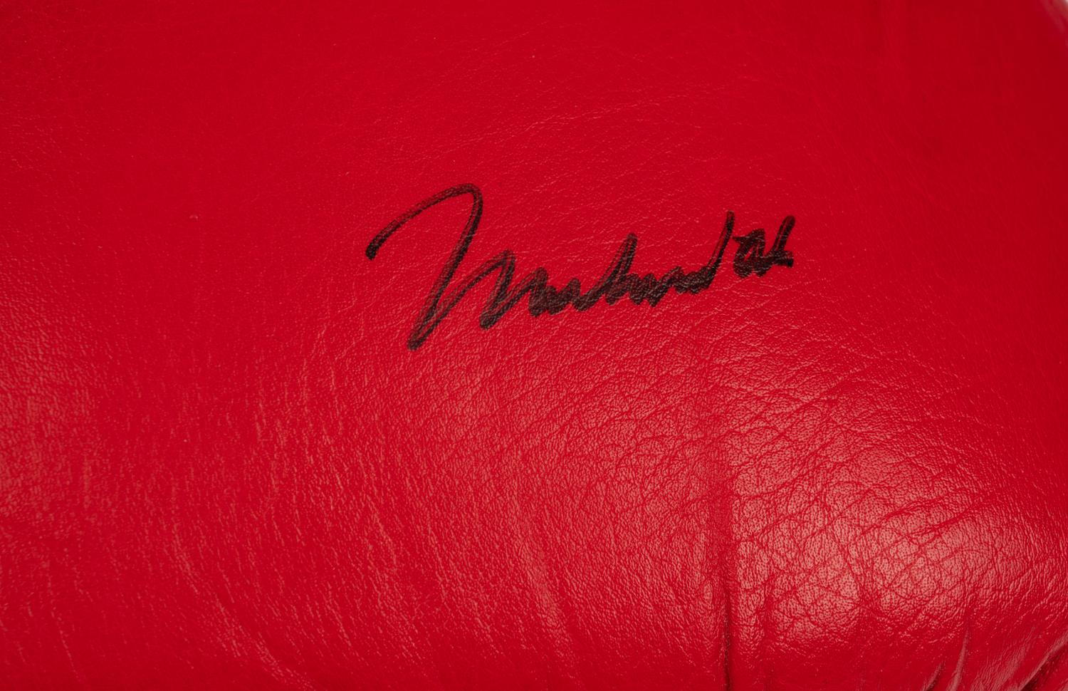 A Muhammad Ali Signed Autograph Boxing Glove (Beckett Authentication Services and Online Authentics)