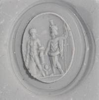 A Roman Carnelian Ring Stone with Two Male Deities and a Child — Set in a gold ring