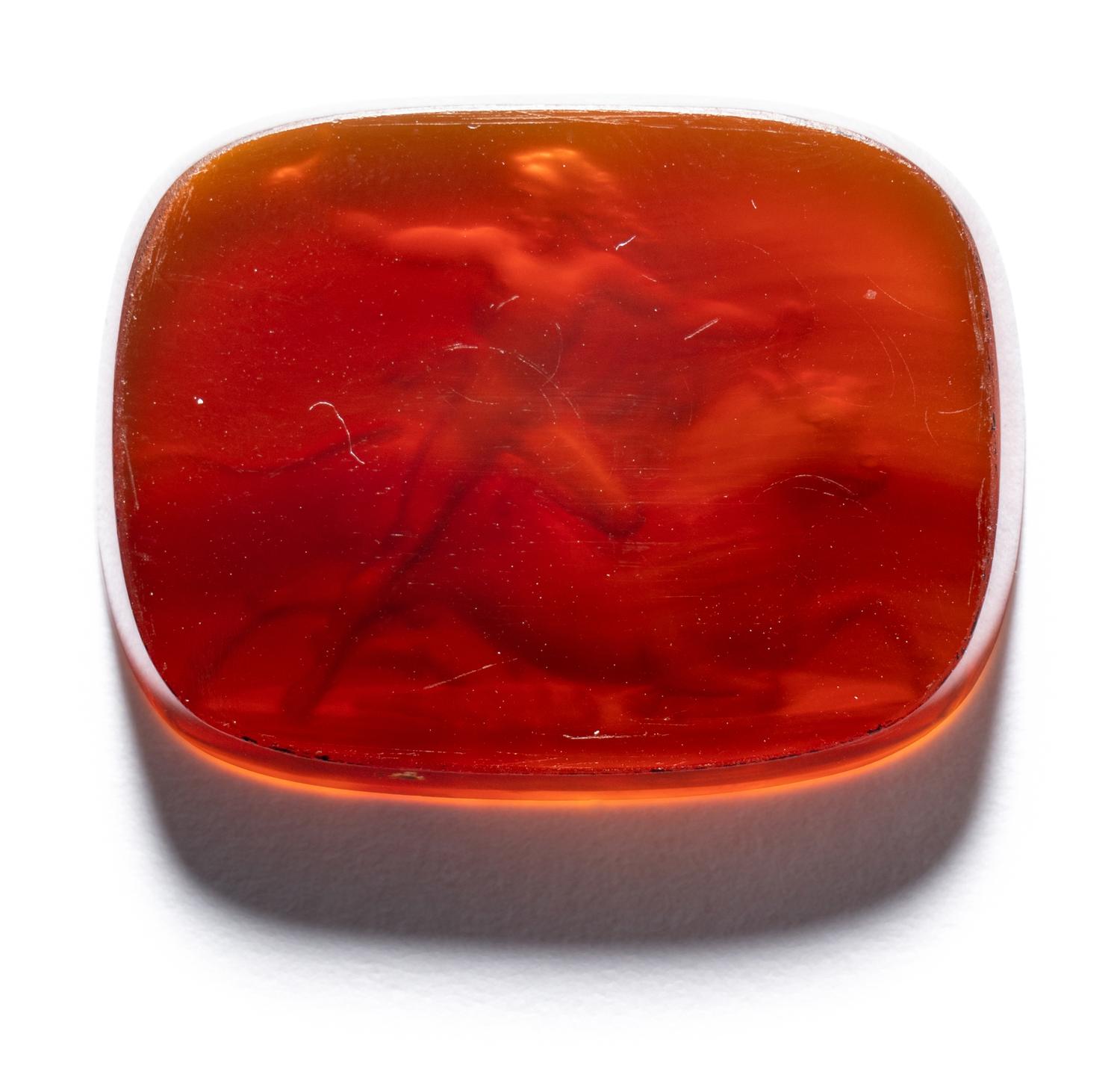 A Neoclassical Carnelian Intaglio with Hercules Battling Achelous