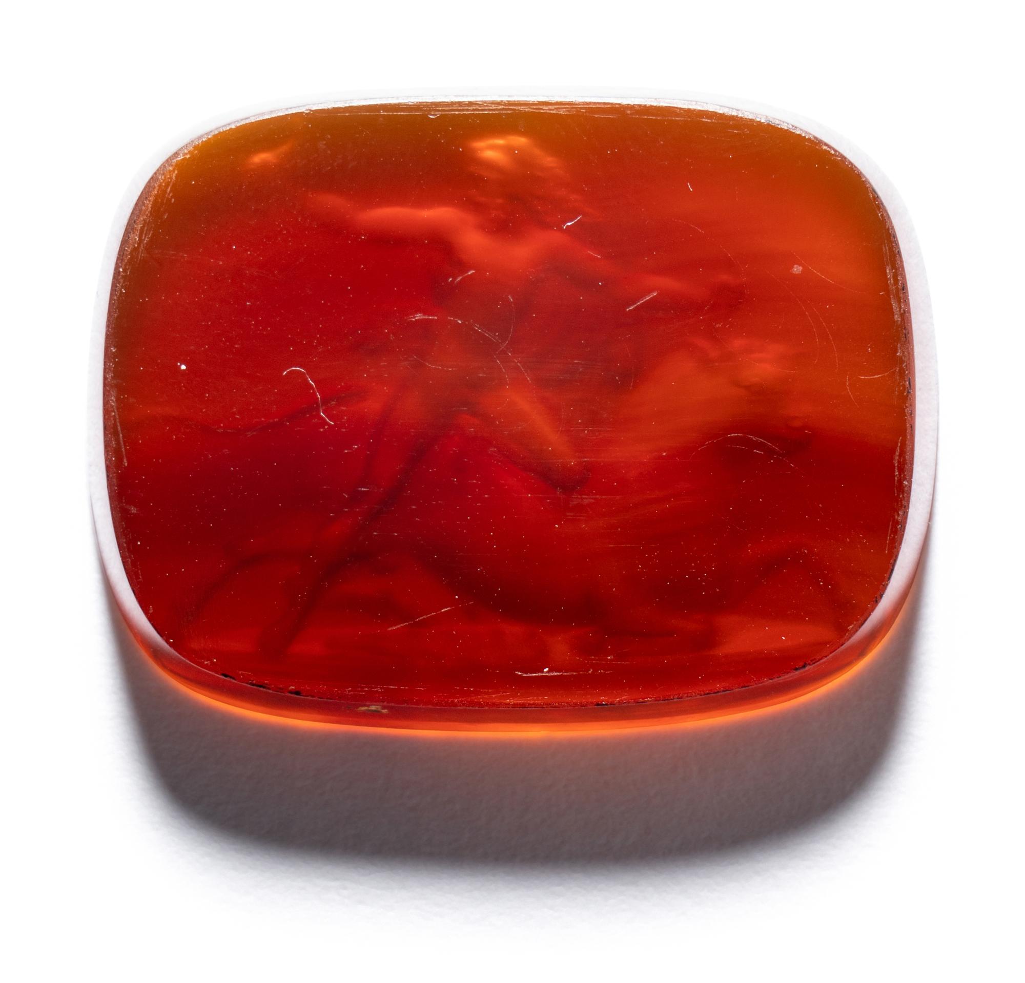 A Neoclassical Carnelian Intaglio with Hercules Battling Achelous