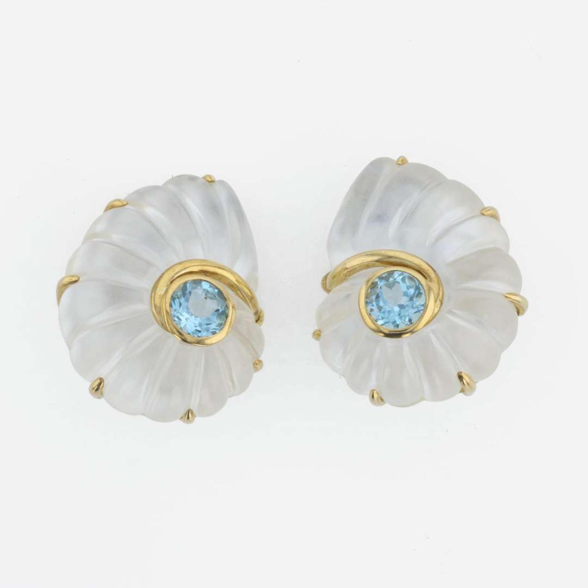 A pair of 18K yellow gold, rock crystal, and blue topaz ear clips, Trianon Nautilus