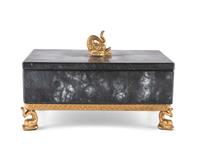 A Gilt and Black Onyx Box with Dolphin Finial