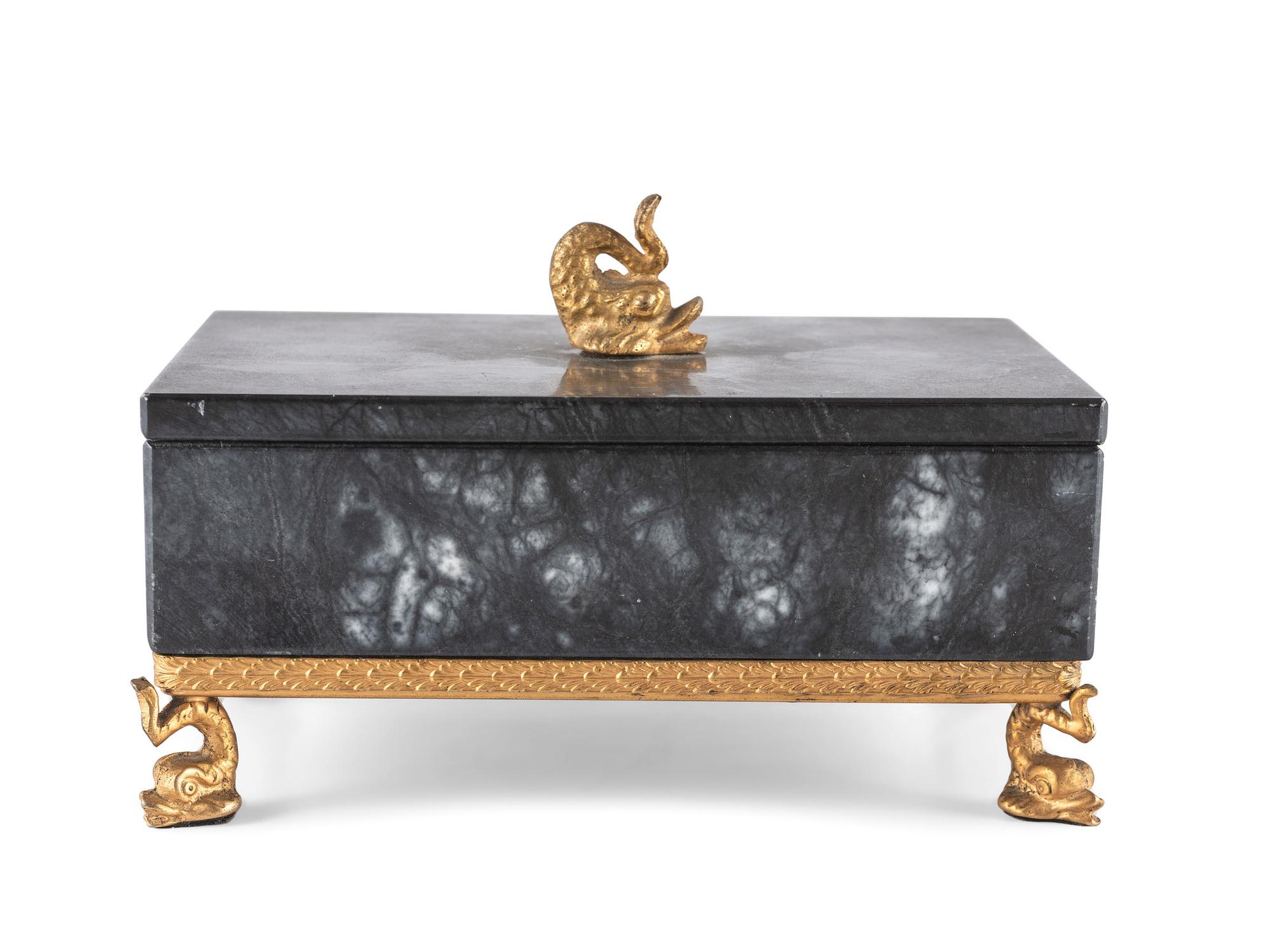 A Gilt and Black Onyx Box with Dolphin Finial