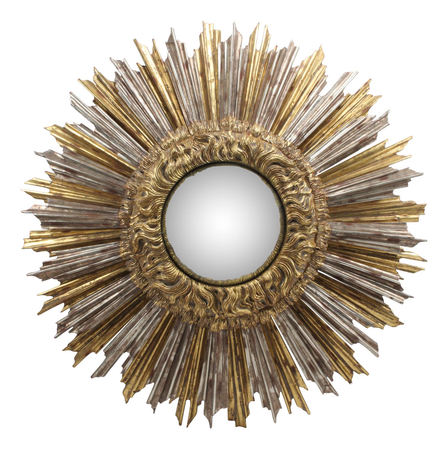 An Oversized Silvered and Giltwood Sunburst Mirror
