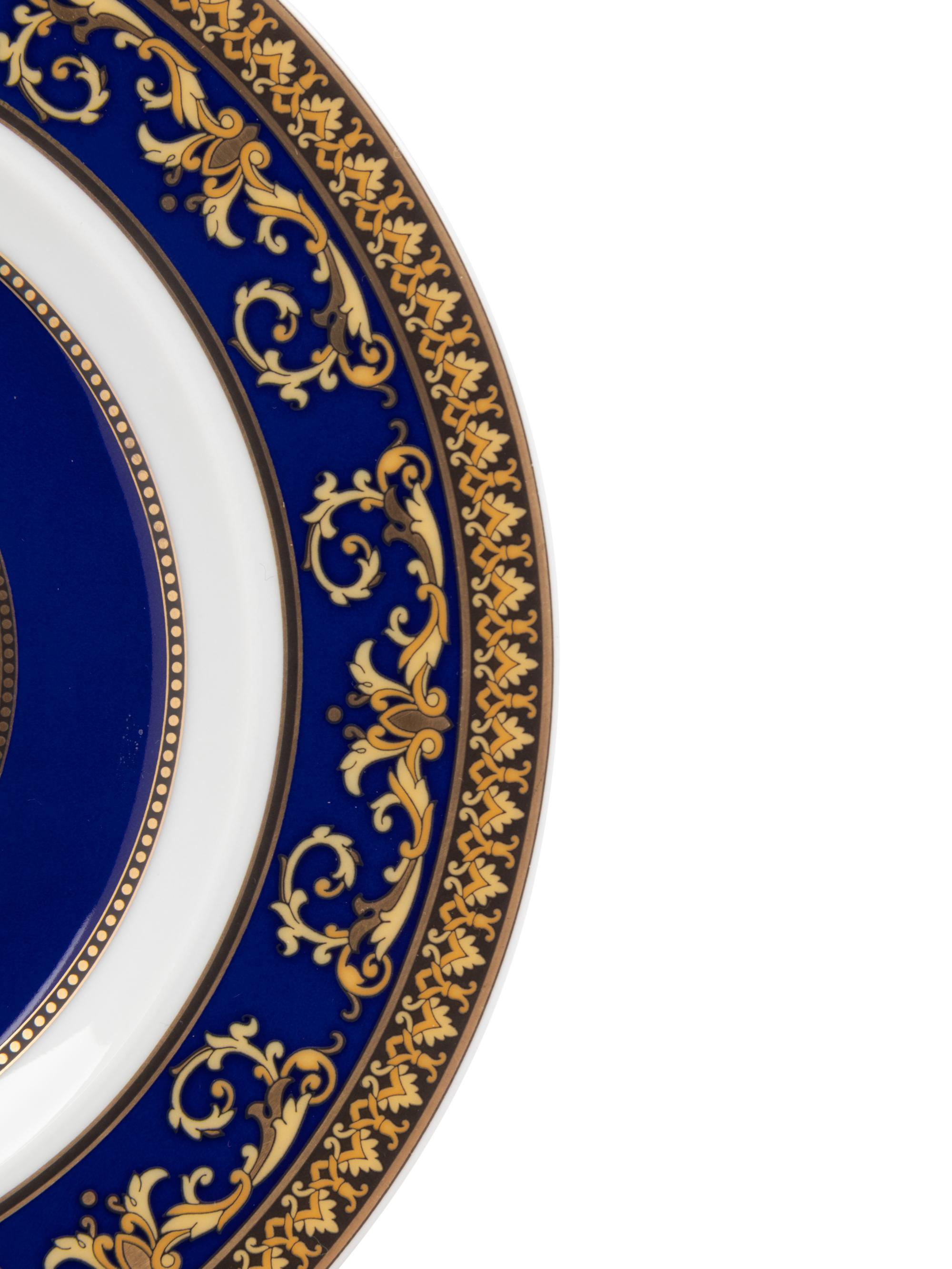 A Group of Versace Medusa Blue Porcelain Table Articles